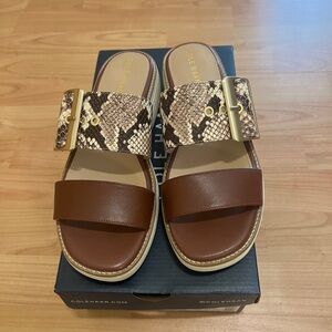 Cole Haan-Brown and Snake Print Sandals runs big Fits a size 8 US.